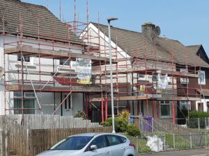 External Wall Insulation being applied to homes with scaffolding